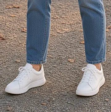 Detail crop of an SI-generated outfit illustration showing a sneakers, similar to the listed item, not exact